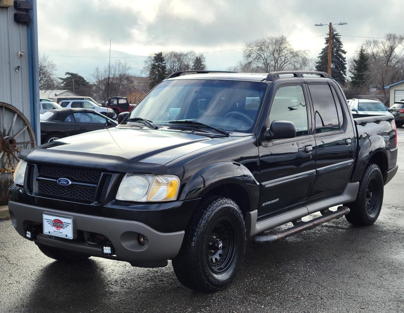 2001 Black /Black Ford Explorer Sport Trac Sport Trac (1FMZU77E41U) with an 4.0L V6 engine, Automatic transmission, located at 450 N Russell, Missoula, MT, 59801, (406) 543-6600, 46.874496, -114.017433 - Hard to find Truck / SUV. 4 Wheel Drive. Automatic Transmission. Nice Wheels and Tires. Power Windows and Locks. Power Back Window. AM FM CD. Air. Cruise. Tilt. Financing is not available on this vehicle. - Photo#1